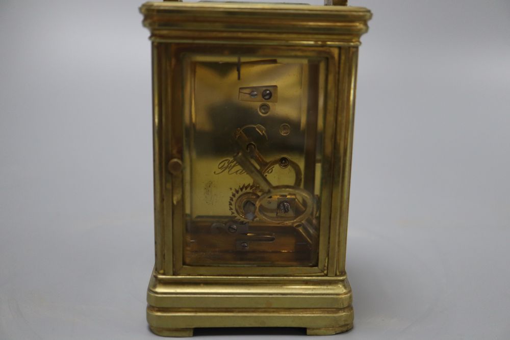 A late 19th century brass carriage timepiece, engraving to the top plate